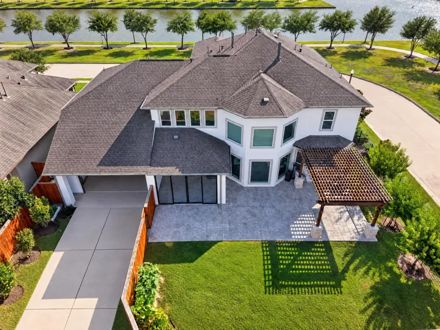 Drone view of a backyard and patio