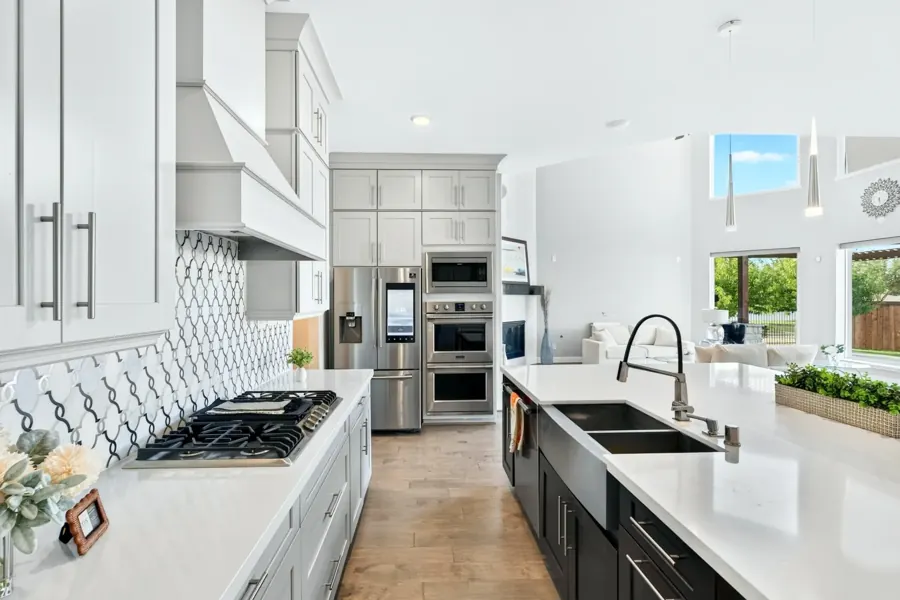 White kitchen with large island
