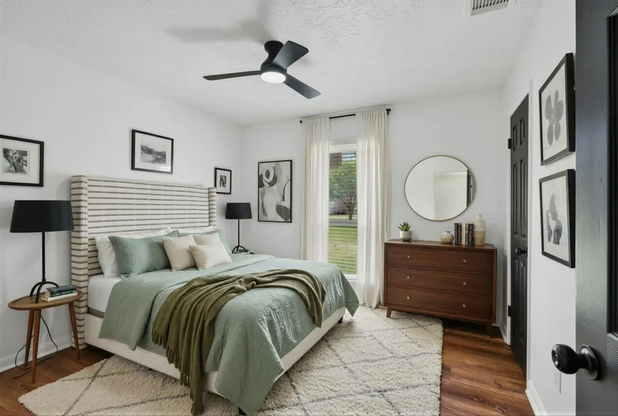 Virtually staged bedroom in sage and walnut